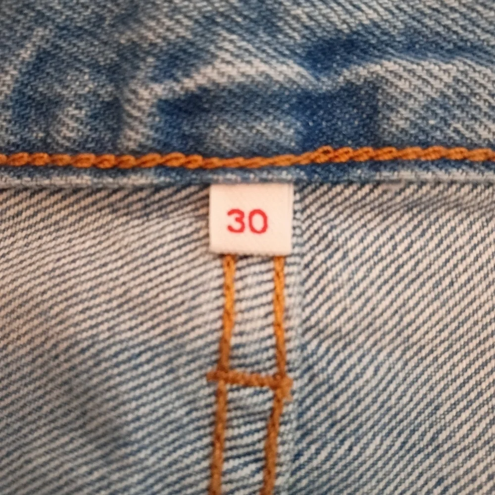 Levi’s Premium High Waisted Denim Mini Skirt Blue Light Wash Distressed Size 30